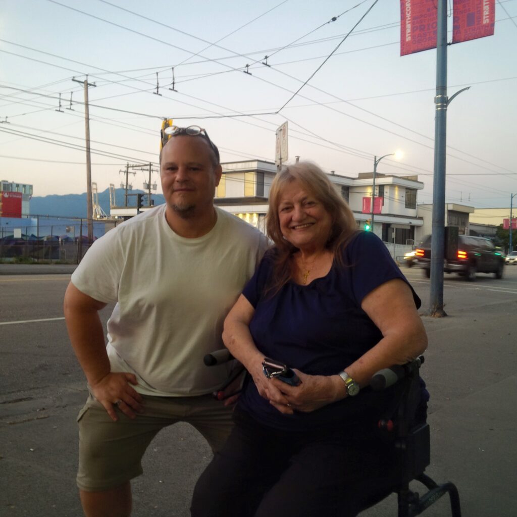 Rev John McILwraith posing with Pastor Gloria as we hand out food. July 27, 2021